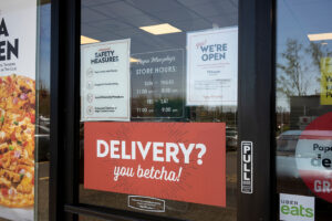 Tigard, OR, USA - Apr 16, 2021: Eye-catching delivery advertisem