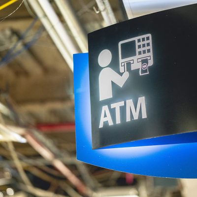 Directional ATM sign